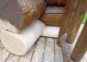 Freshly fitted replacement logs on a log home